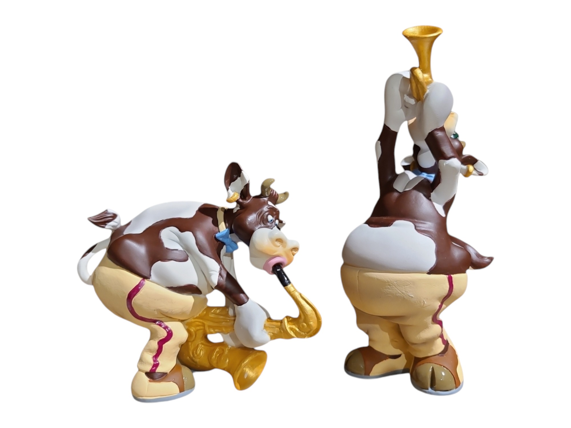 Set of Cow - Playing the Saxophone and Trumpet